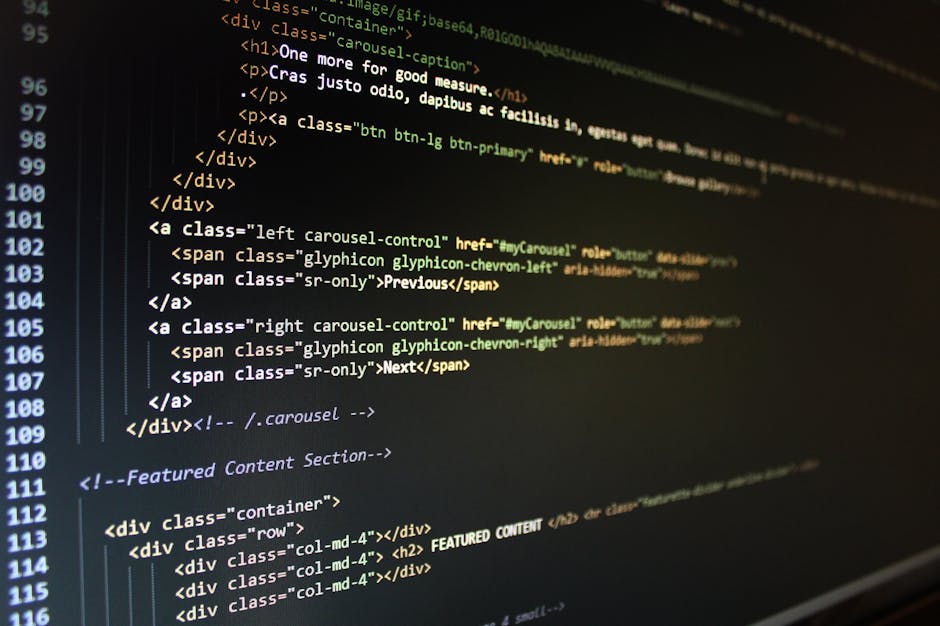 A close-up view of a computer screen displaying a CSS stylesheet with lines of code in various colors, including yellow, white, orange, and red, on a dark background. The code includes style definitio